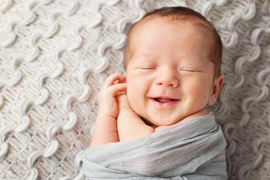 Smiling Sleeping Newborn Miette Photography
